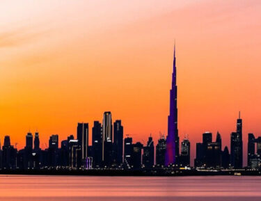 a cityscape at sunset