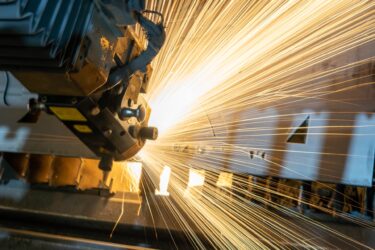 reforming the safeguard mechanism - man welding