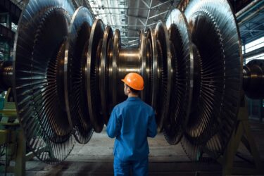 nger data - man with big round machine disks