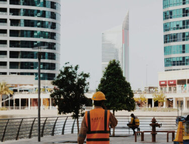 urban worker in dubai's modern architecture