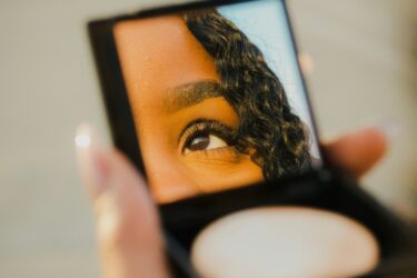 Staying Ahead of ESG Compliance: The Business Value of High-Quality Data Person using beauty products