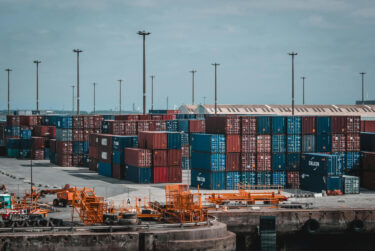 Supply Chain Collaboration: The Key to Achieving Supply Chain Sustainability supplier crates at a dock