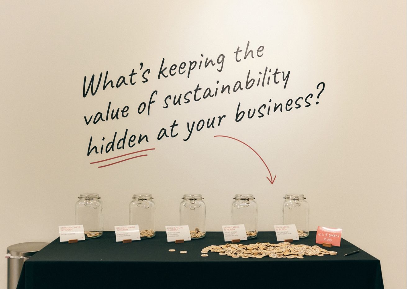 poker chips on a table with slogan on wall about hidden value