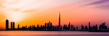 a cityscape at sunset